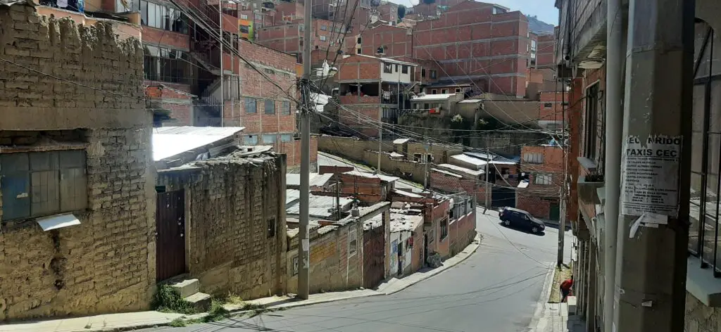 Poor people's houses made with adobe or orange bricks in the Altiplano, La Paz, Bolivia